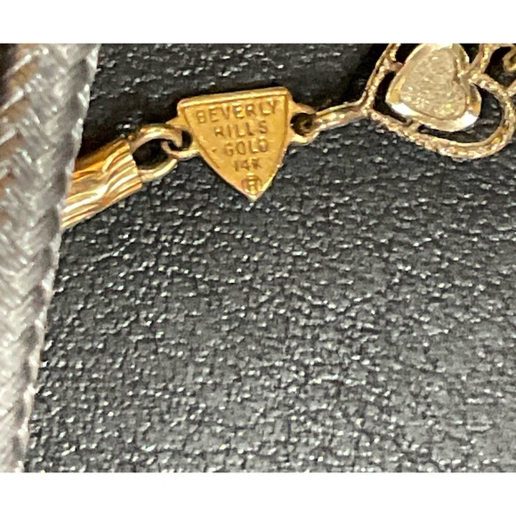 Beverly Hills Gold: 14k.tri colored gold heart shaped tennis 7” inch bracelet. - Picture 5 of 8